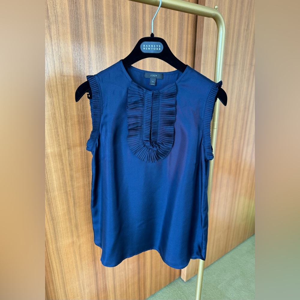 J Crew sleeveless silk top.